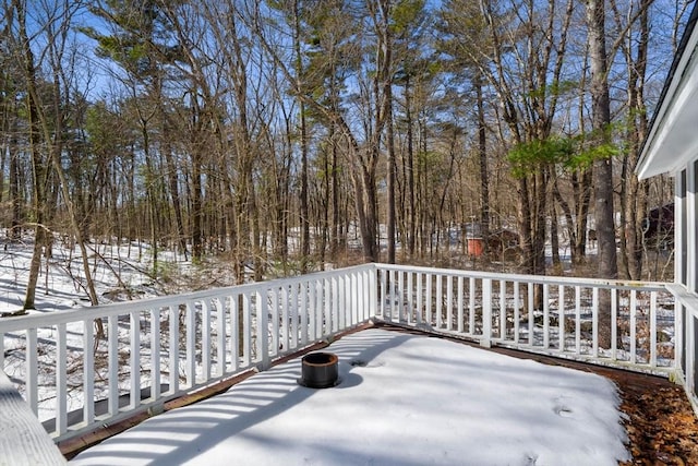 view of snow covered deck