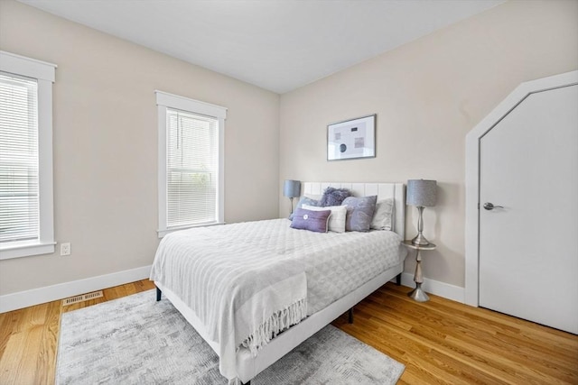 bedroom featuring hardwood / wood-style flooring