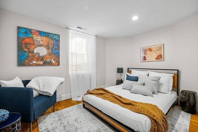 bedroom featuring light hardwood / wood-style floors