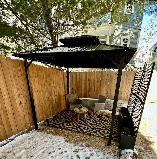 view of snow covered patio