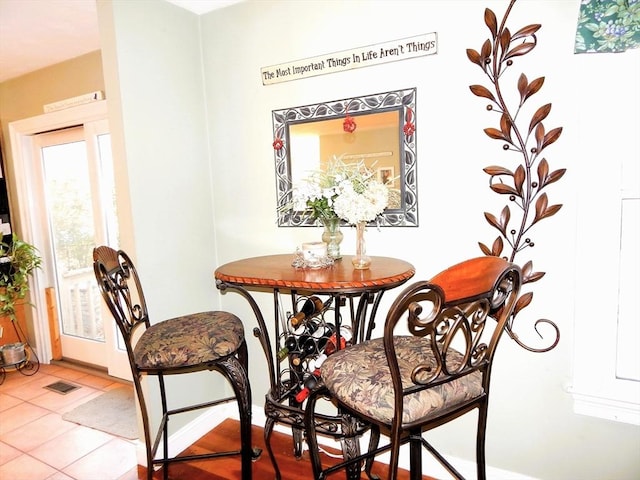 view of tiled dining space