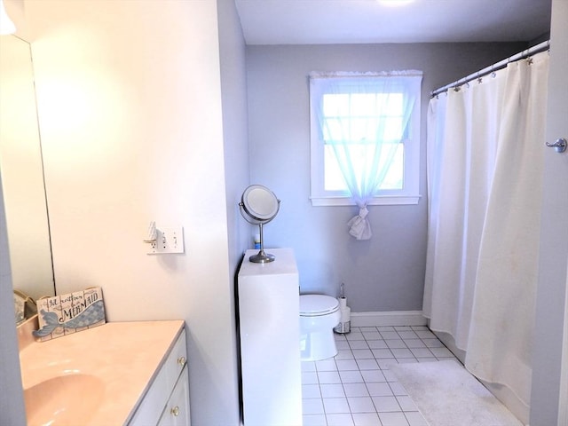 bathroom featuring a shower with shower curtain, vanity, toilet, and tile patterned flooring