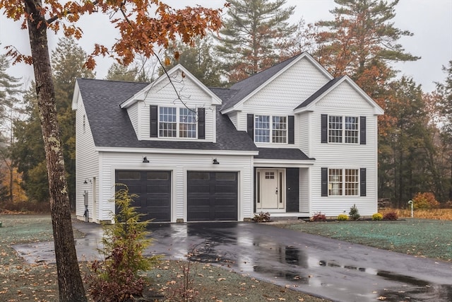 view of front of property featuring a garage