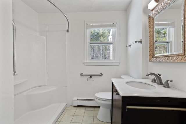 bathroom with tile patterned flooring, walk in shower, a wealth of natural light, and a baseboard radiator