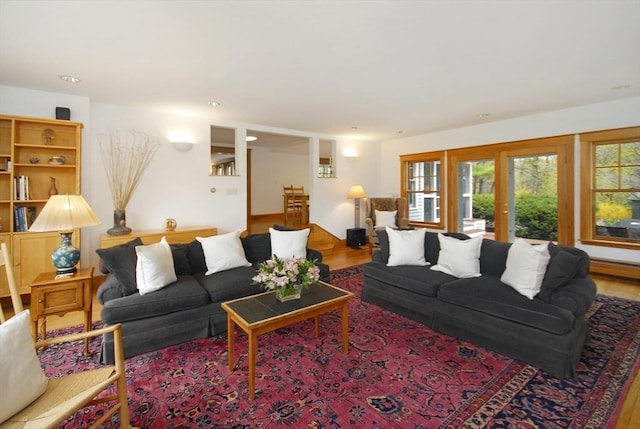 living room featuring recessed lighting and wood finished floors