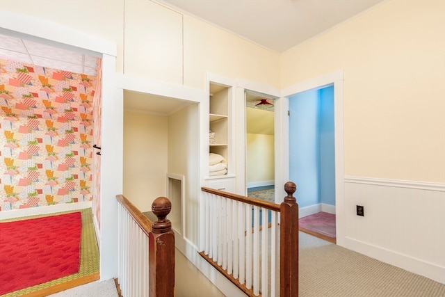 hallway with light colored carpet