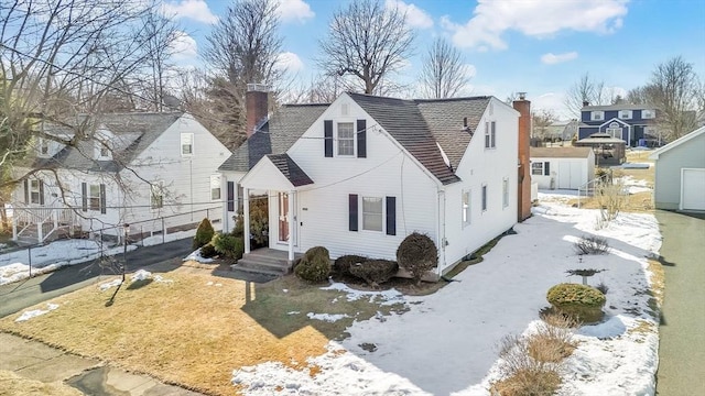 view of front of property with a chimney