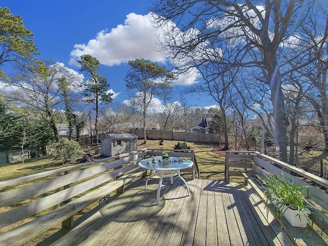 11 Great Oak Rd, Brewster, MA 02631 - wooden deck featuring a fenced backyard, an outbuilding, and a storage shed