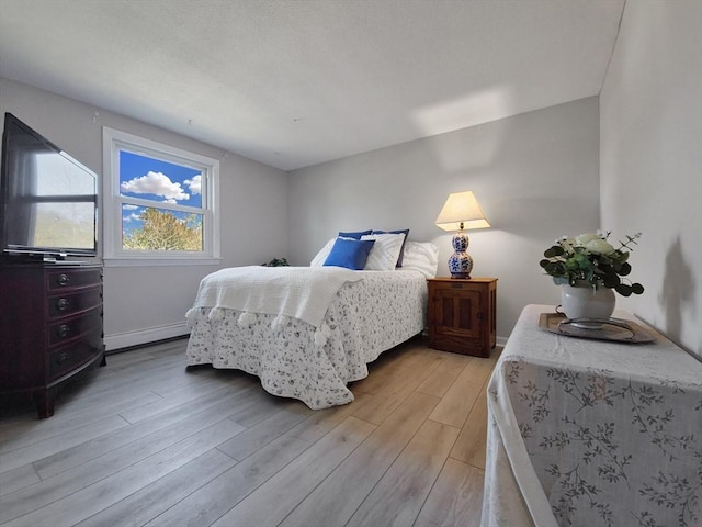 11 Great Oak Rd, Brewster, MA 02631 - bedroom featuring baseboards and light wood-style flooring