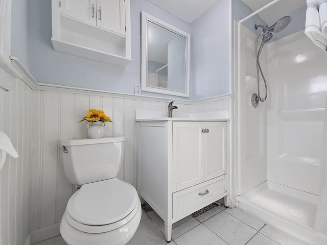 11 Great Oak Rd, Brewster, MA 02631 - bathroom with a wainscoted wall, toilet, vanity, and walk in shower