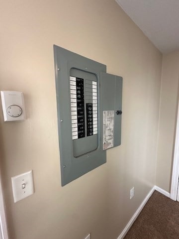 utility room featuring electric panel