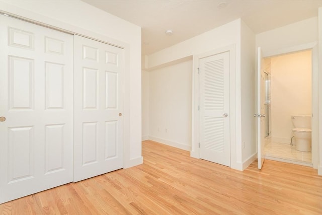 148-150 Pleasant St, Boston, MA 02125 - unfurnished bedroom with light wood-style flooring and baseboards