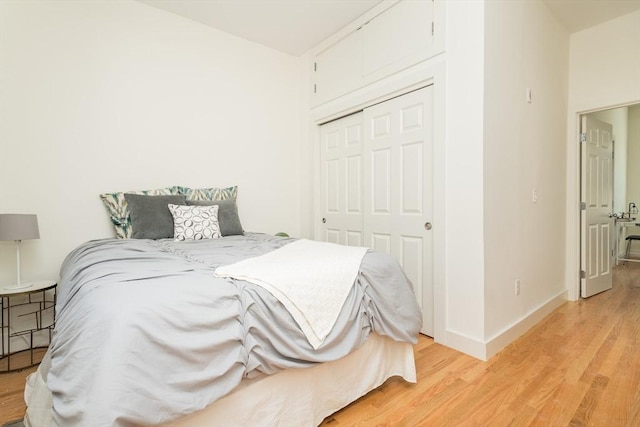148-150 Pleasant St, Boston, MA 02125 - bedroom featuring light wood-style floors and a closet