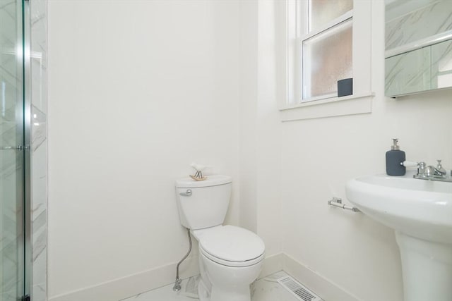 148-150 Pleasant St, Boston, MA 02125 - full bath featuring a marble finish shower and marble look tiles