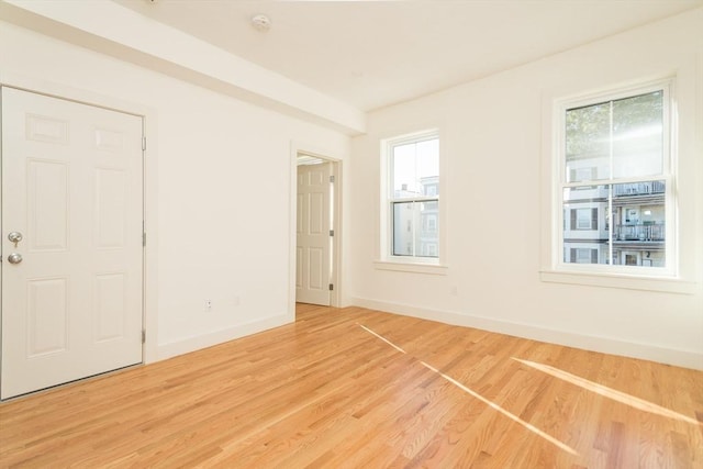 148-150 Pleasant St, Boston, MA 02125 - empty room featuring light wood-type flooring and baseboards