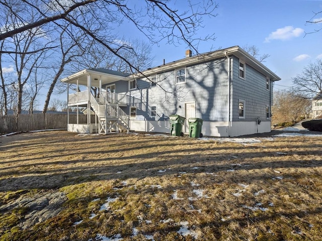 back of house with a balcony