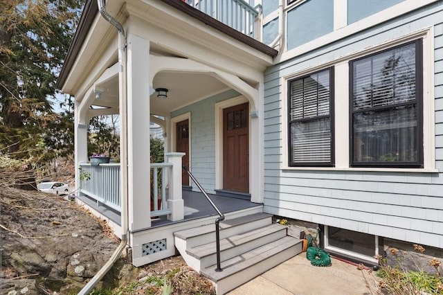 doorway to property with covered porch