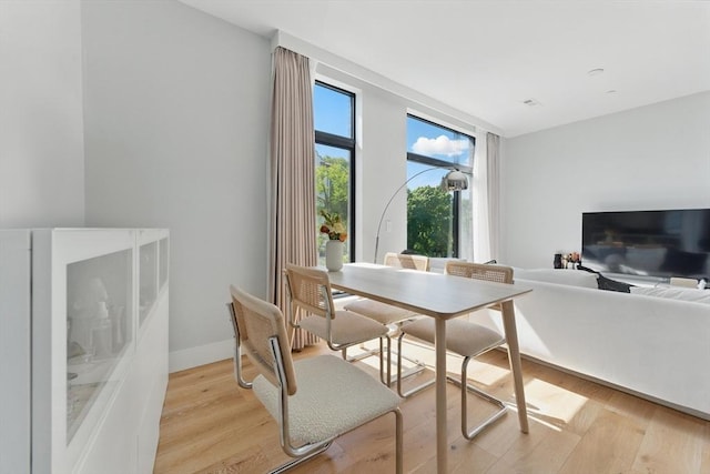 191 Washington St Unit 524, Boston, MA 02135 - dining space with light wood finished floors and baseboards