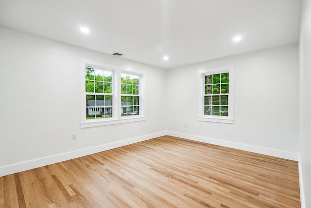 22 Longhill Rd, Ashland, MA 01721 - spare room featuring wood finished floors, baseboards, and recessed lighting