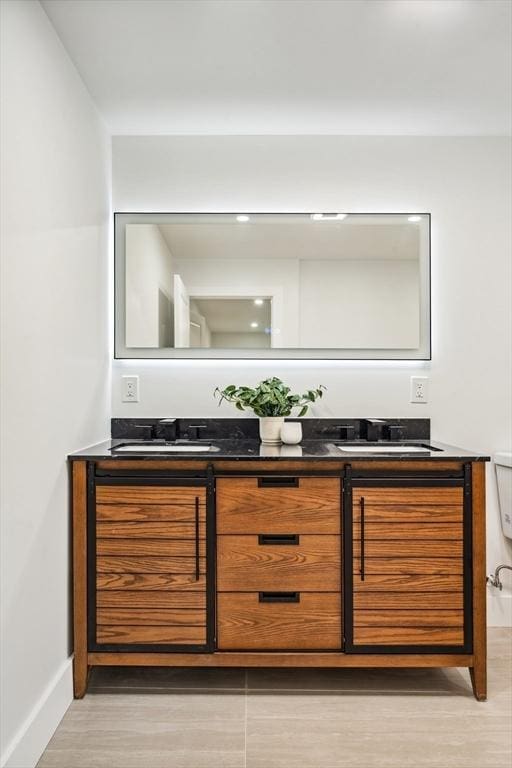22 Longhill Rd, Ashland, MA 01721 - bar area with a sink, baseboards, and light wood-style floors