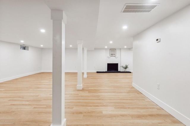 22 Longhill Rd, Ashland, MA 01721 - finished below grade area featuring a fireplace, wood finished floors, baseboards, and recessed lighting