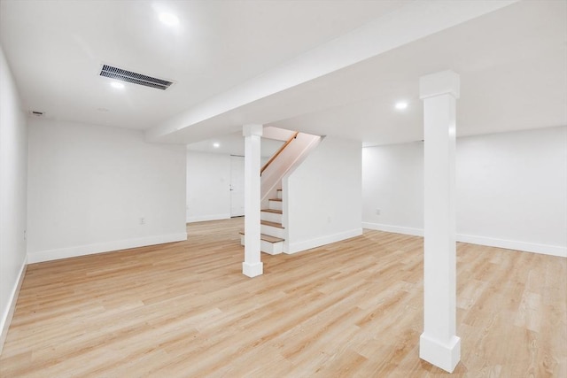 22 Longhill Rd, Ashland, MA 01721 - finished basement featuring light wood-style flooring, baseboards, and stairway
