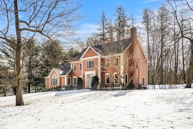 view of front of house with a chimney