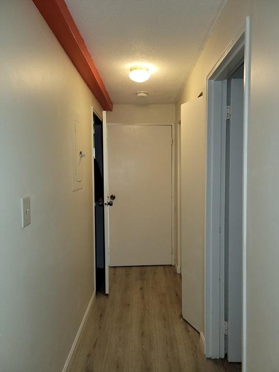 4 Post Oak Ln Unit 15, Natick, MA 01760 - hallway featuring wood finished floors and a textured ceiling