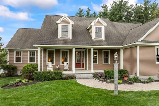 32 Rideout Rd, Hollis, NH 03049 - cape cod-style house with covered porch, a front lawn, and a shingled roof
