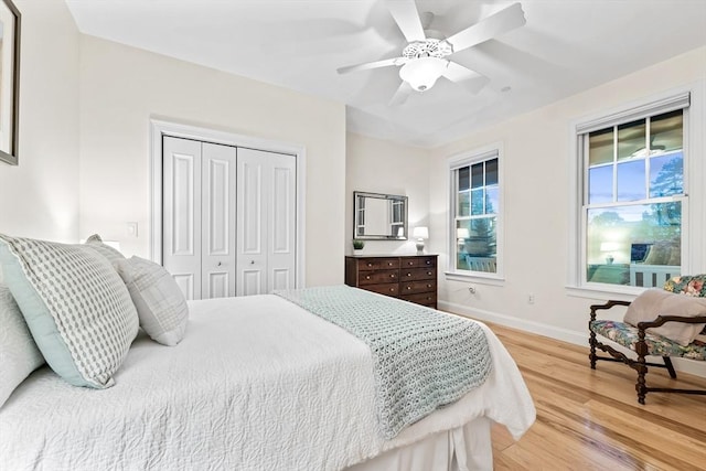 32 Rideout Rd, Hollis, NH 03049 - bedroom featuring light wood-style floors, a closet, and ceiling fan