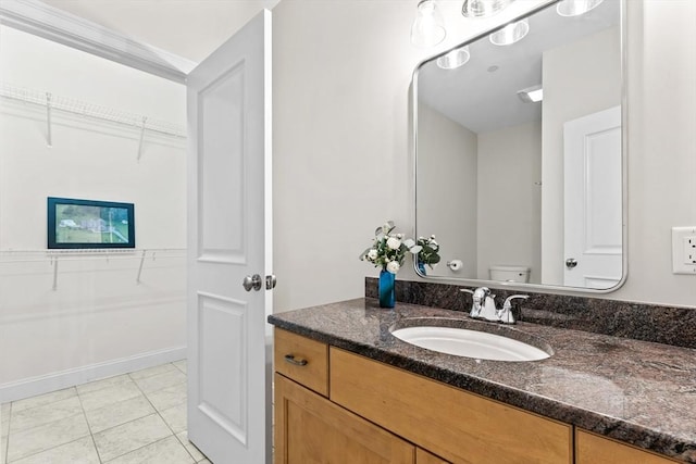 32 Rideout Rd, Hollis, NH 03049 - bathroom featuring vanity and a spacious closet