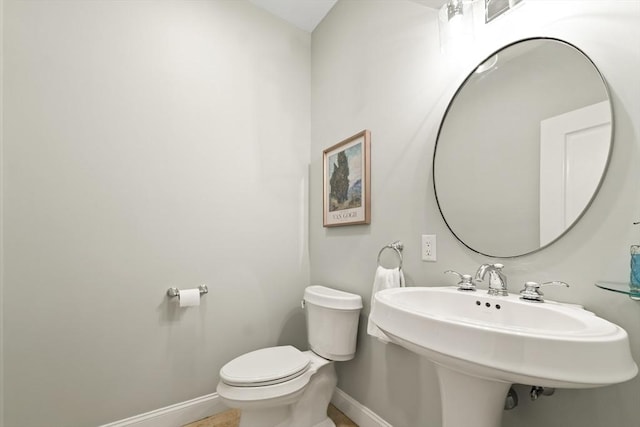 32 Rideout Rd, Hollis, NH 03049 - half bath featuring baseboards and toilet