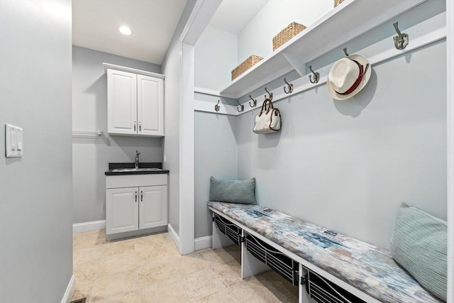32 Rideout Rd, Hollis, NH 03049 - mudroom featuring baseboards and wet bar