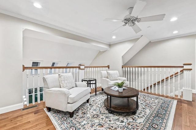 32 Rideout Rd, Hollis, NH 03049 - sitting room with ceiling fan, crown molding, recessed lighting, wood finished floors, and an upstairs landing