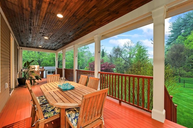 32 Rideout Rd, Hollis, NH 03049 - deck with outdoor dining area, area for grilling, and view of wooded area