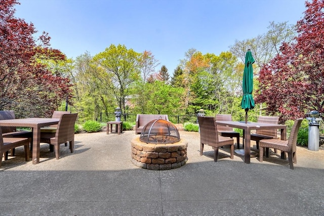 view of patio / terrace featuring a fire pit and outdoor dining space
