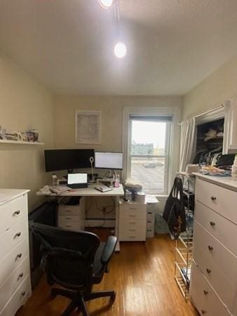 office area featuring light wood finished floors