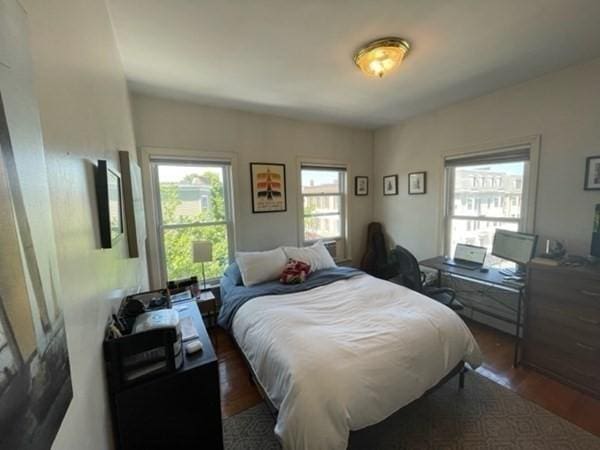 bedroom with wood finished floors