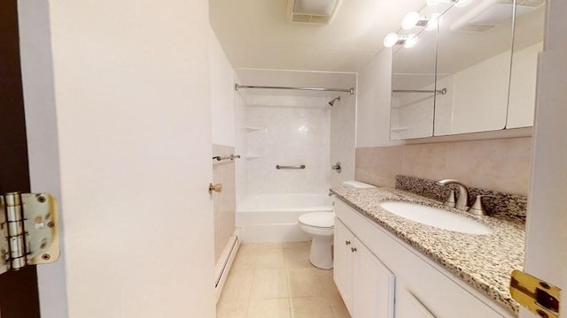 164 Galen St Unit 65, Watertown, MA 02472 - bathroom with vanity, toilet, tub / shower combination, tile patterned floors, and baseboard heating