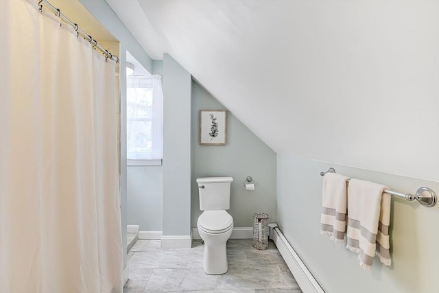 bathroom featuring a shower with shower curtain, baseboards, vaulted ceiling, a baseboard heating unit, and toilet