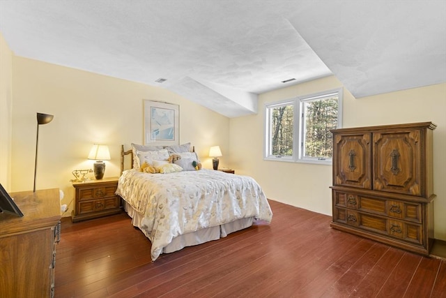 bedroom featuring dark wood-type flooring