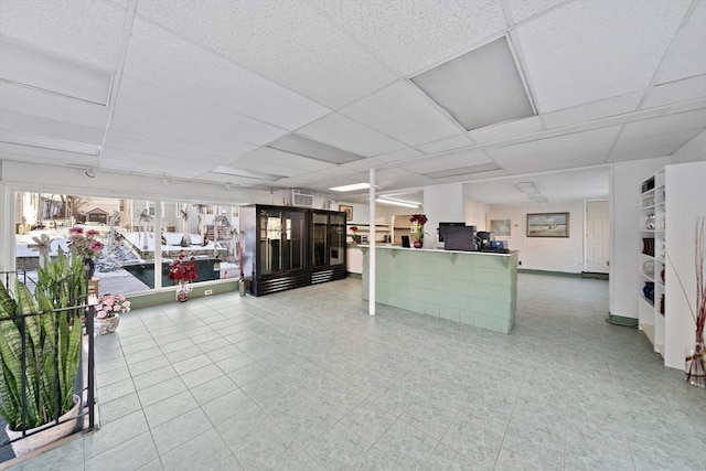 interior space featuring a paneled ceiling