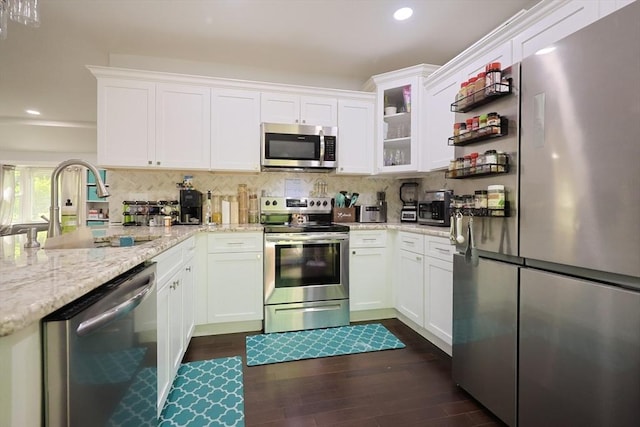 47 Leno Rd, Holland, MA 01521 - kitchen with stainless steel appliances, a sink, dark wood-type flooring, recessed lighting, and white cabinetry