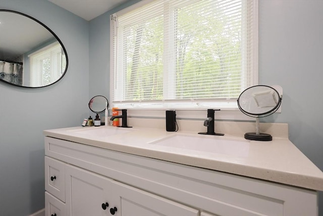 47 Leno Rd, Holland, MA 01521 - bathroom with plenty of natural light and double vanity