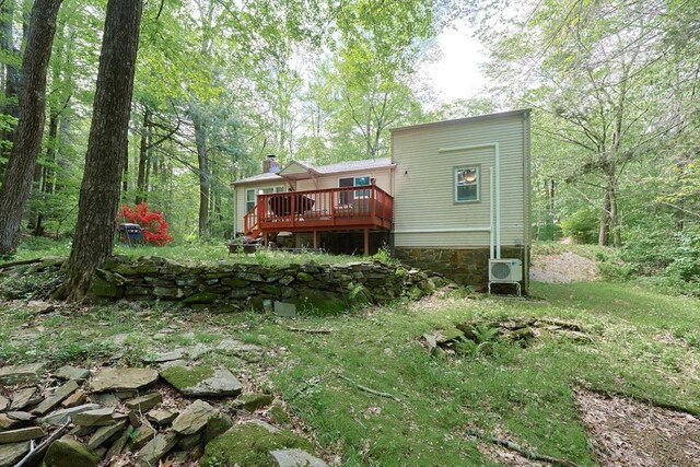 47 Leno Rd, Holland, MA 01521 - rear view of house with a wooden deck, a chimney, and ac unit