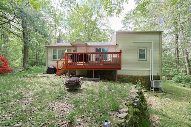 47 Leno Rd, Holland, MA 01521 - back of house with a fire pit, a wooden deck, a chimney, and ac unit