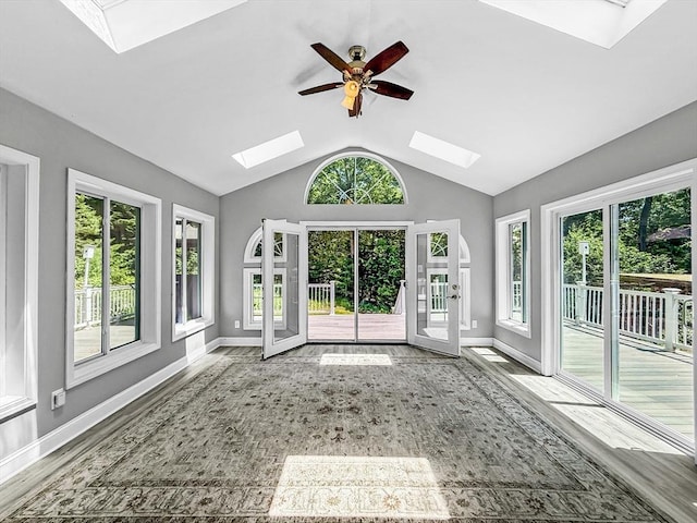 15 Stone Fence Dr, Derry, NH 03038 - unfurnished sunroom featuring a skylight, french doors, and vaulted ceiling
