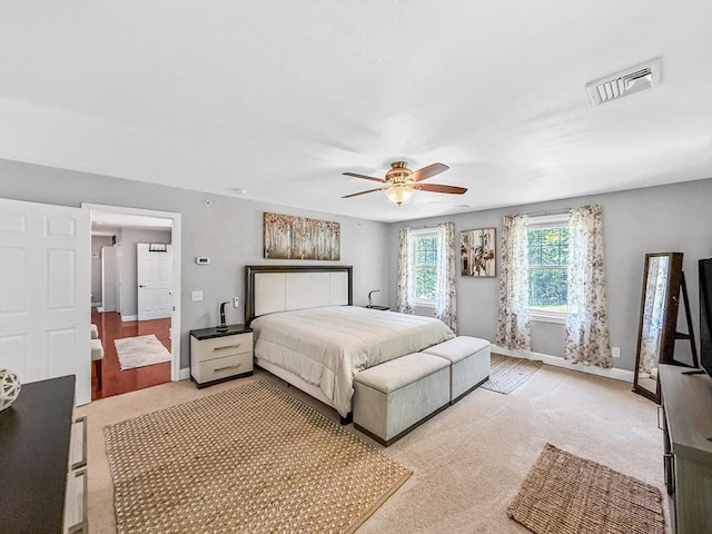 15 Stone Fence Dr, Derry, NH 03038 - bedroom with light carpet and a ceiling fan