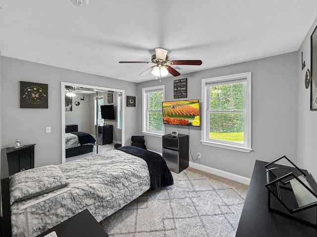 15 Stone Fence Dr, Derry, NH 03038 - bedroom featuring light colored carpet, a ceiling fan, and a closet