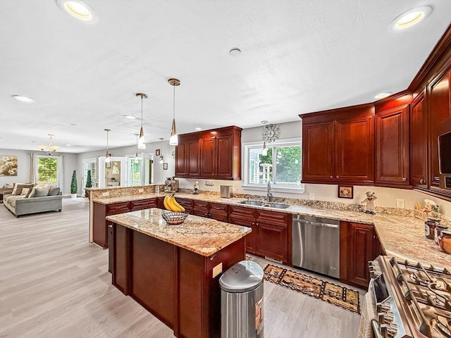 15 Stone Fence Dr, Derry, NH 03038 - kitchen with stainless steel appliances, healthy amount of natural light, light wood-style floors, a peninsula, and recessed lighting